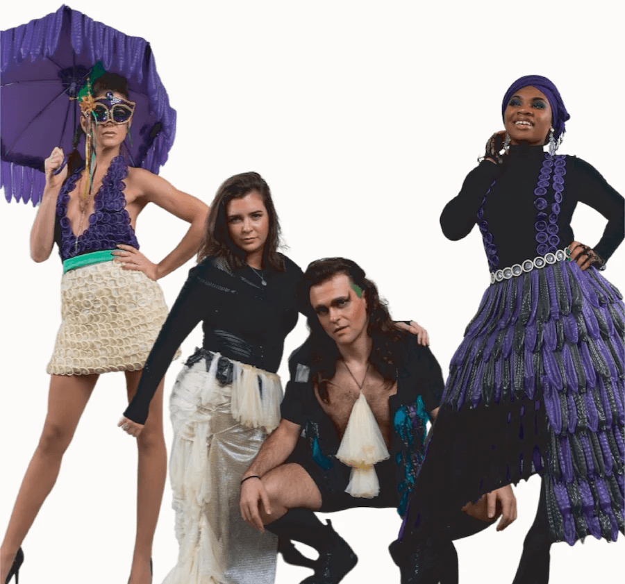 Four people wearing stylish outfits with a focus on fashion and design.